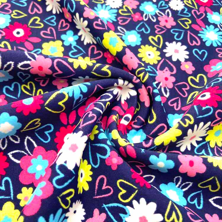 TESSUTO IN SPANDEX STAMPATO FIORI COLORATI